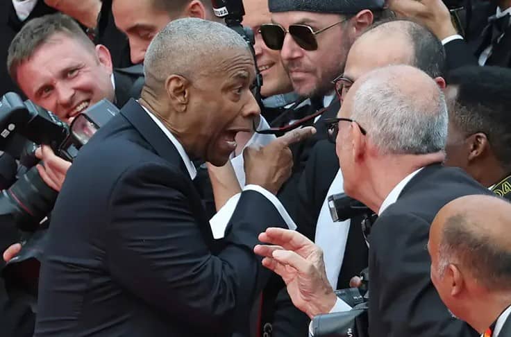 Denzel Washington confronta a fotógrafo en Cannes